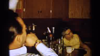 New Hampshire (1952): Several People Gathered Around A Table With Drinks Talking