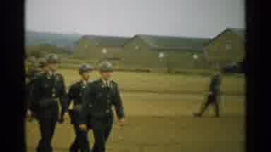 New Hampshire (1952): People In Uniforms Marching In Unison With Bigger Group