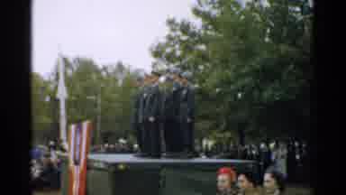 New Hampshire (1952): Military Men Standing And Saluting On A Stage In Front Of A
