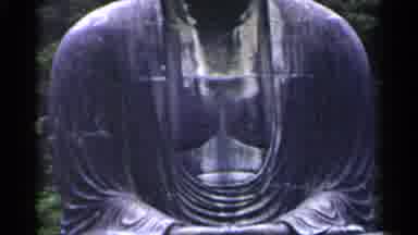 Japan (1953): Dark Gray Buddha Statue And Green Trees On A Clear Day