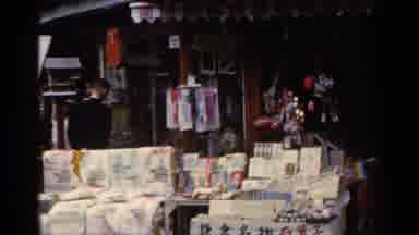 Japan (1953): Child Walking In Market In Asian Country