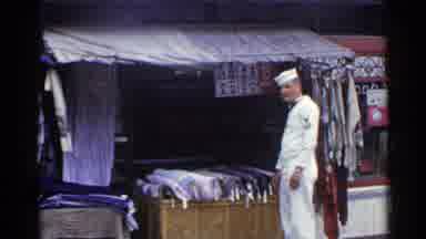 Japan (1953): Bicycle And Sailor In An Outdoor Rug Market With A Lot Of Chopped
