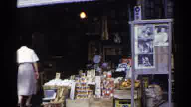 Japan (1953): A Woman Entering A Public Asian Food Market In The Middle Of The Day