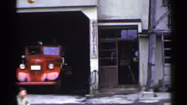Japan (1953): A Jeep Parked In Garage And Other Bicycles Are Kept In Standing