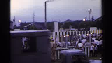 Japan (1953): Several People Arriving At A Fair Climb Out Of A Truck