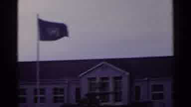 Japan (1953): Camera Pans Over The Roof Of A Building With The Un And Japanese
