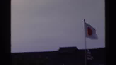 Japan (1953): Japanese Flag In The Air Moved By The Breeze On A Windy Day On Top