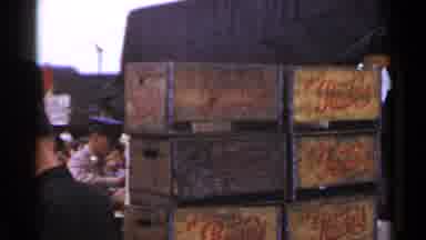 Japan (1953): Man Inspects Empty Cola Boxes Then Boy And Girl Take Wobbly Elephant