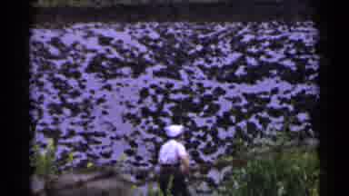 Japan (1953): A Child Walking Towards A Strangely Colored Purple And Black Wall
