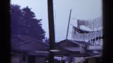 Japan (1953): Lots Of Clothing Hanging On Top Of The Houses Because They Have No
