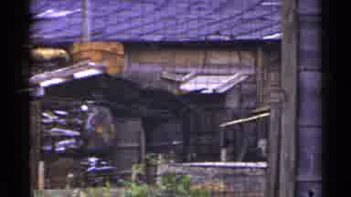 Japan (1953): A House Made Of Wood With It's Pain Starting Wore Off Over The Years