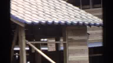 Japan (1953): In Motion Footage Passing Homelike Structures And People Walking
