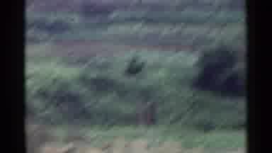 Japan (1953): Zoomed In View From Moving Vehicle While Passing Through Traffic And