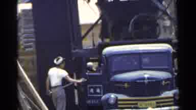 Japan (1953): Small Town In Poor Condition With Hard Labor And Trucks