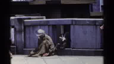 Japan (1953): Man Sitting In The Middle Of The Street May Be Old India