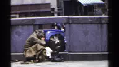 Japan (1953): Forlorn Homeless Person Sits By Wall Then Pedestrians Walk As