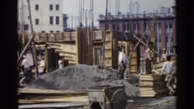 Japan (1953): Several People Work With Wood At A Construction Site