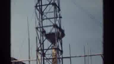 Japan (1953): It Takes Many Guy Wires To Secure The Tall Tower That Seems To Go Up