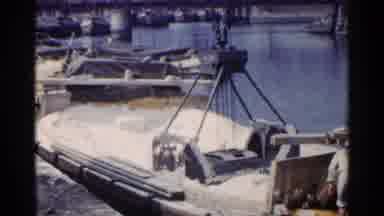 Japan (1953): A Crane Picks Up Cargo Off A Ship