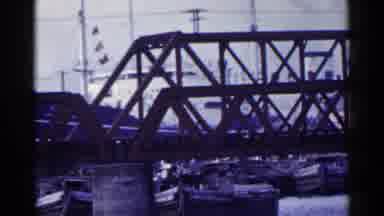 Japan (1953): Steel Bridge Over Water On A Cloudy Day
