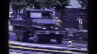 Japan (1953): Vintage Multiple Types Of Vehicles Driving Down A City Road