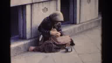 Japan (1953): Homeless Person Sitting On A Bridge And Sleeping With People Walking