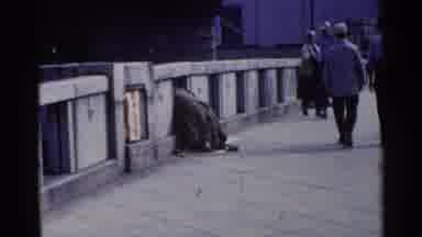 Japan (1953): People Crossing The Bridge And Homeless Person On The Side