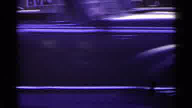 Japan (1953): Homeless Person Sits By A Wall As A Car Passes And Busy Walkers Pass