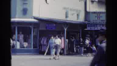 Japan (1953): People Shopping Downtown On Foot And Then A Man Pushing A Wagon