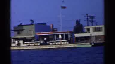California (1955): Water Boats Boats Buildings House Flag Pole Wires White Harbor