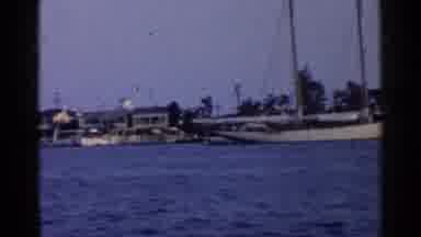 California (1955): A Port Somewhere With Boats And Houses In The Background