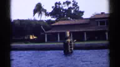 California (1955): Scenic Houses And Buildings Along A Shoreline Filmed From A