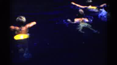 California (1955): Yellow Tubes On Wet Short Blond Hair Children In Pool Swimming
