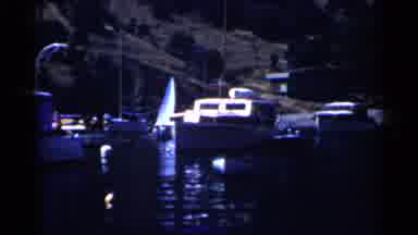 California (1955): An Image Of Several Ships Docked At The Pier While One Is