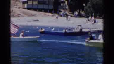 California (1955): Many People Are Boating In Small Boats And Enjoying The Beach