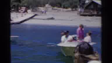 California (1955): Family Paddle Around A Lake In Boats Enjoying A Summer Day