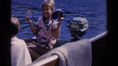 CALIFORNIA-1955: Fisherman On Boat And Kid Having Fun With Fishing Tools