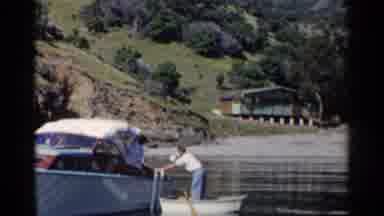 California (1955): A Gentleman In A Small Row Boat Pulls Alongside A Larger Boat