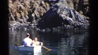 California (1955): Two Men On A Lake In A Boat Rowing In Circles