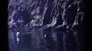 California (1955): An Ocean Side Cove With A Brief Appearance From A Boat And
