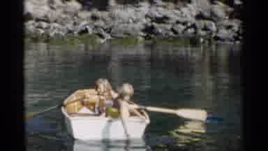 California (1955): Two Children Boating On Water