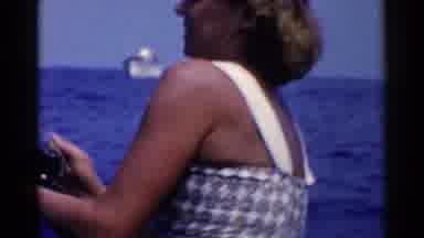 California (1955): Woman Fishing With Man On Nice Day On The Water