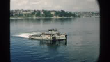 Pearl Harbor Hawaii (1958): Steam Powered Ship Quickly Sailing Across Shore