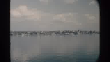 Pearl Harbor Hawaii (1958): A Display Of Houses In The Background While Showcasing