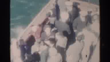 Pearl Harbor Hawaii (1958): A Group Of People Riding On A Boat As Some Wave While
