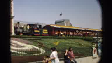 Disneyland-1959: Disneyland Railroad Train Arriving With Guests On Board