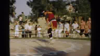 Disneyland-1959: Native American Dancer Performing Traditional Regalia Dance Before Crowd