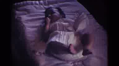 Ohio USA (1959): Very Young Infant Laying Down On A Bed