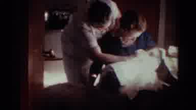 Ohio USA (1959): Mom Holding Baby And Dad Brings Towel To Her The Baby Mom Pets