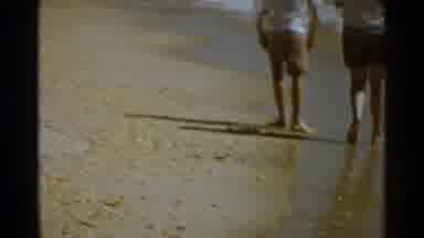 San Francisco (1959): An Adult And Child Walk On The Beach And Along The Shore